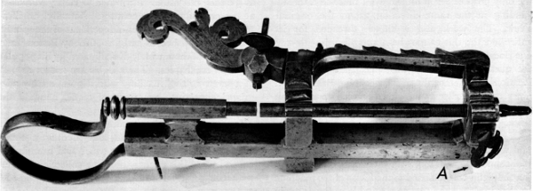Figure 3.&mdash; Small thread-cutting lathe which was made to
be held in a vise during use. It was found as shown here, with only the
operating crank missing. The overall length is approximately 12 inches,
depending on the adjustment of parts. (Smithsonian photo 46525B.)