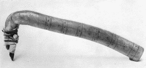 c. "Tools of the Mandans for dressing leather, Dakota. Drs. Gray and Matthews, U. S. A." Handle
of antler, with flint blade attached. Extreme length of handle about 11 inches. (U.S.N.M. 8409)