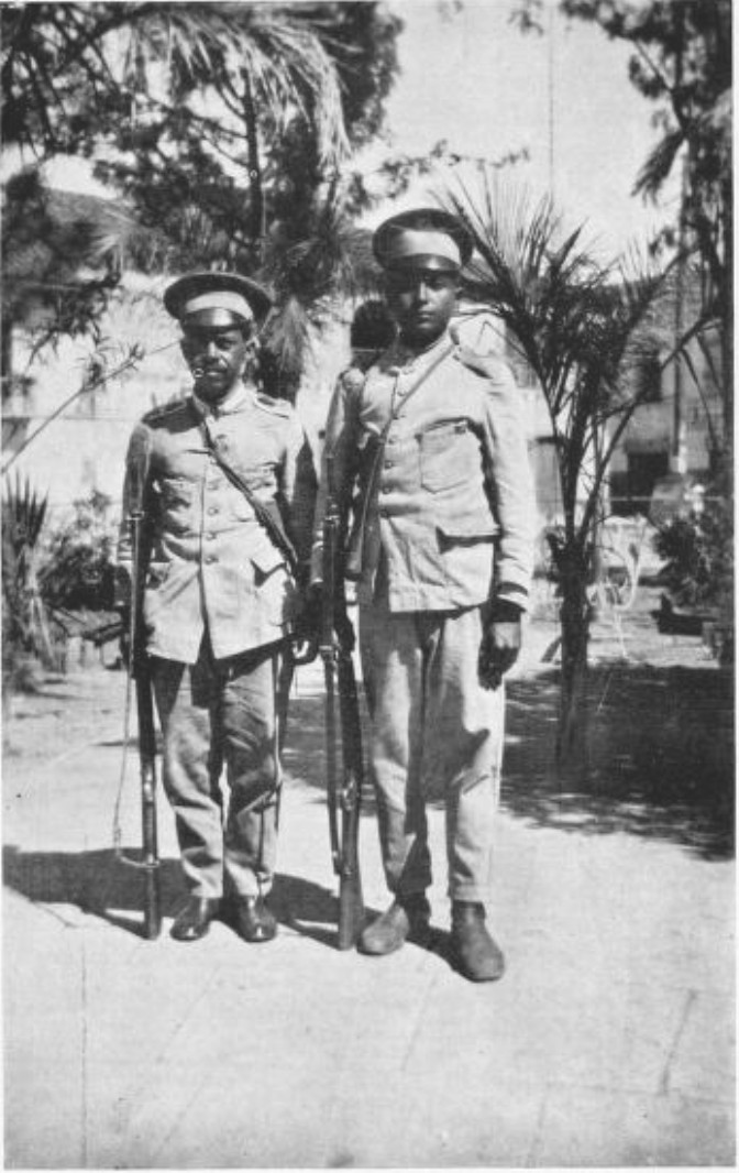 SOLDIERS STOPPED A PEDESTRIAN AT EVERY CORNER TO
SEARCH FOR WEAPONS