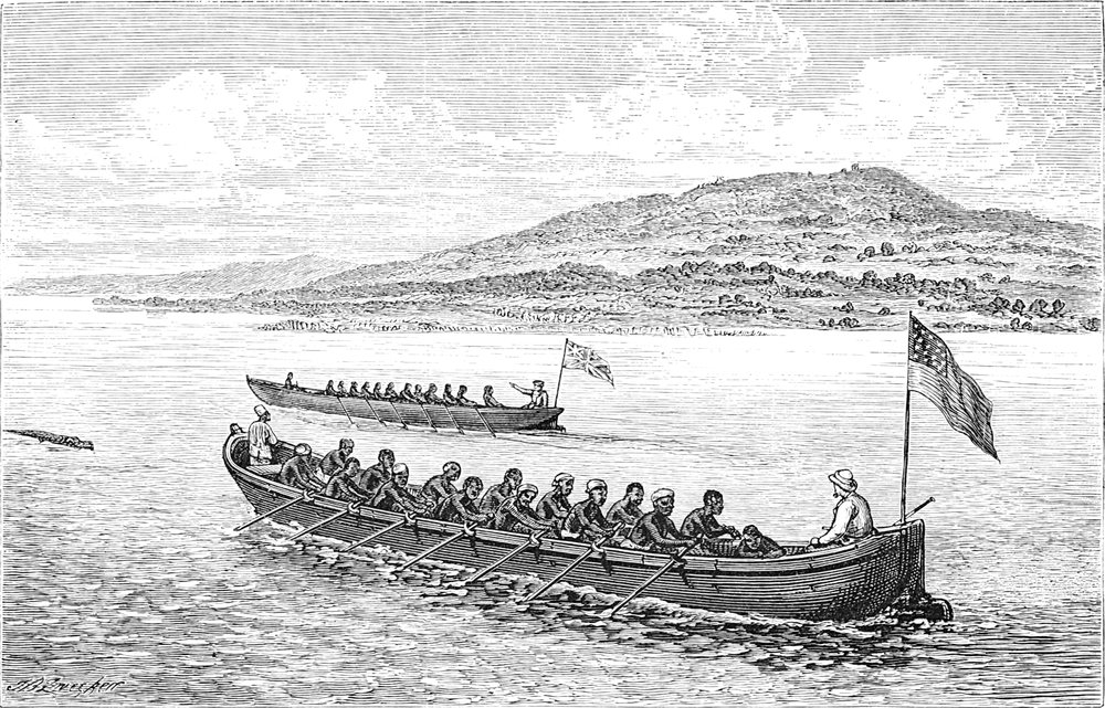 Zwei große Ruderboote
  mit britischer und amerikanischer Flagge